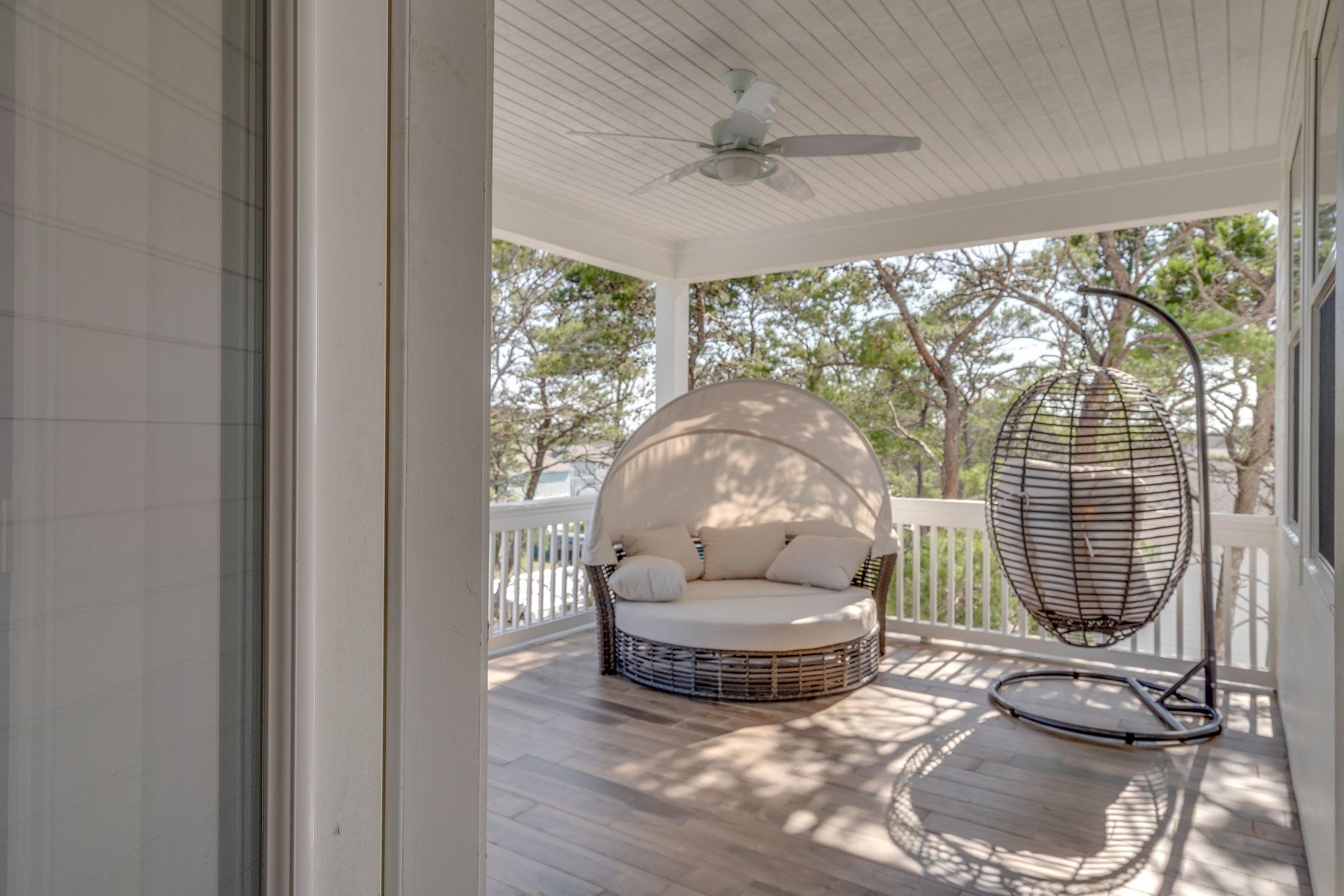 157 Valdare Ln Inlet Beach Inlet Beach, FL 32461 - Photo 64 of 71 a living room with furniture and a floor to ceiling window