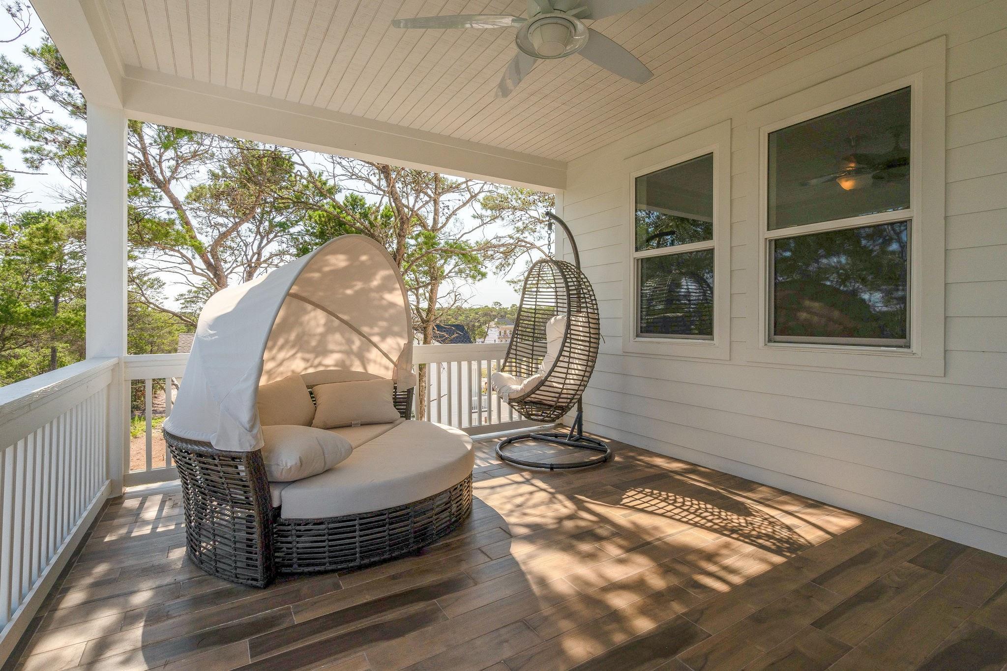 157 Valdare Ln Inlet Beach Inlet Beach, FL 32461 - Photo 66 of 71 a living room with furniture and a floor to ceiling window