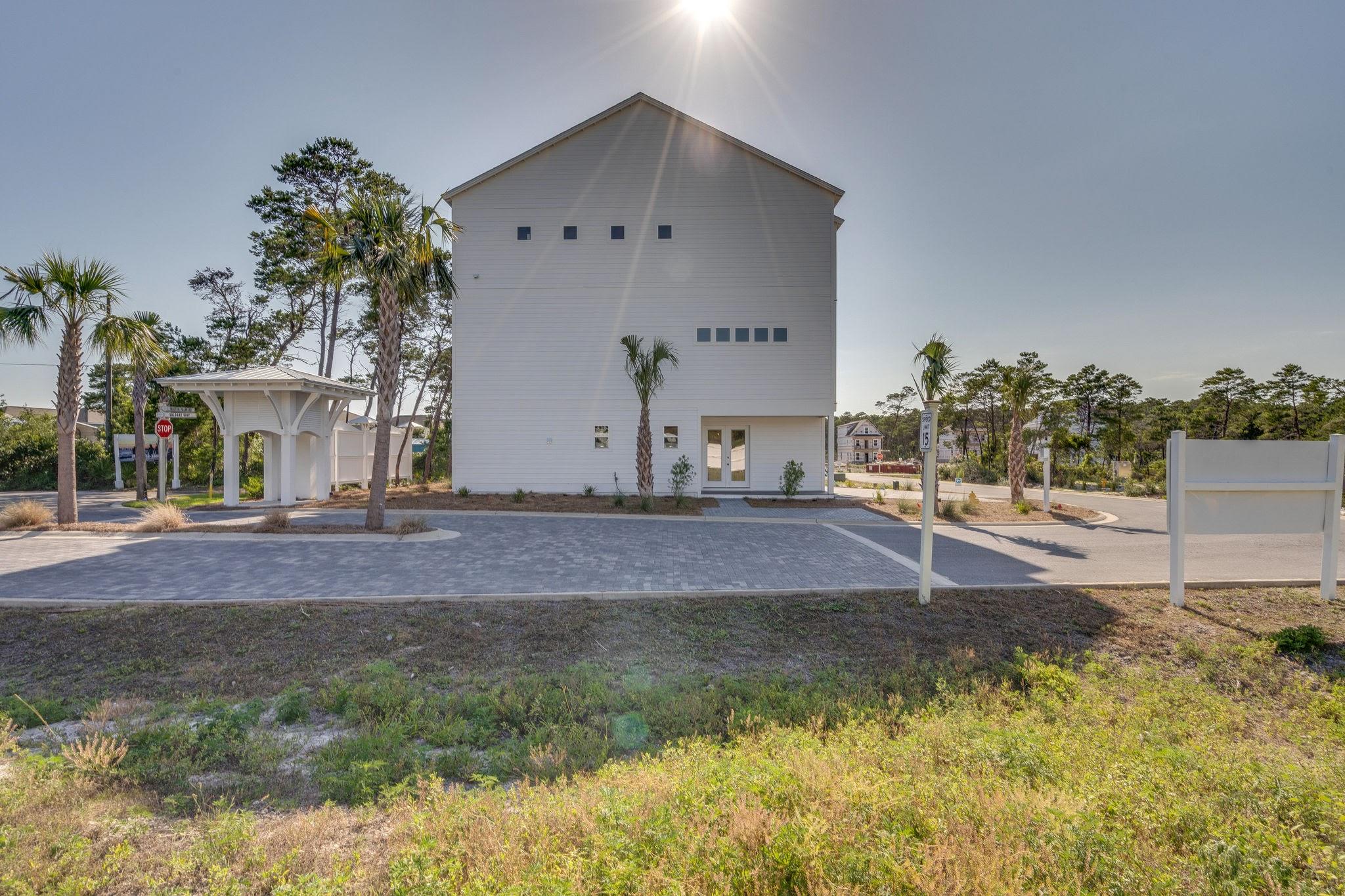 157 Valdare Ln Inlet Beach Inlet Beach, FL 32461 - Photo 69 of 71 a view of a house with a yard