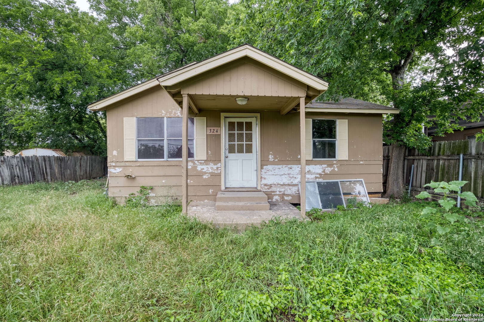 324 Overlook Road San Antonio, TX 78233 - Photo 1 of 1 a front view of a house with garden