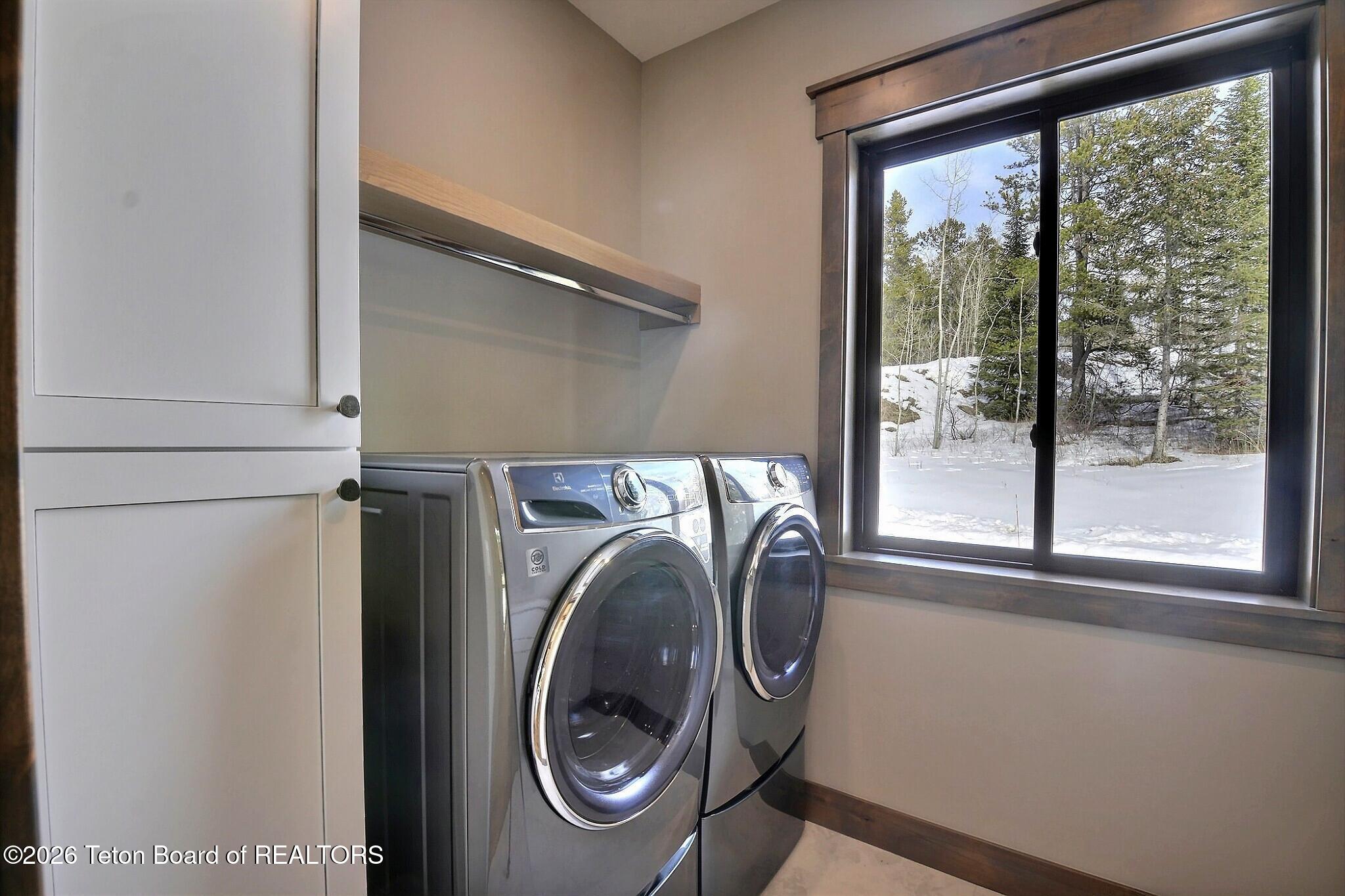 5727 Forest Ridge Road Victor, ID 83455 - Photo 41 of 76 Main Floor Laundry