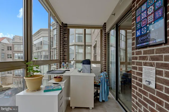 a room with a table and chairs