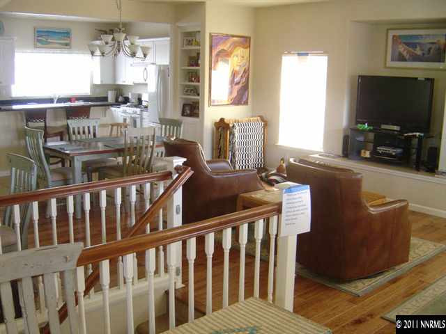 2151 Virginia Lake Way Reno, NV 89509 - Photo 3 of 9 a bedroom with furniture and a flat screen tv