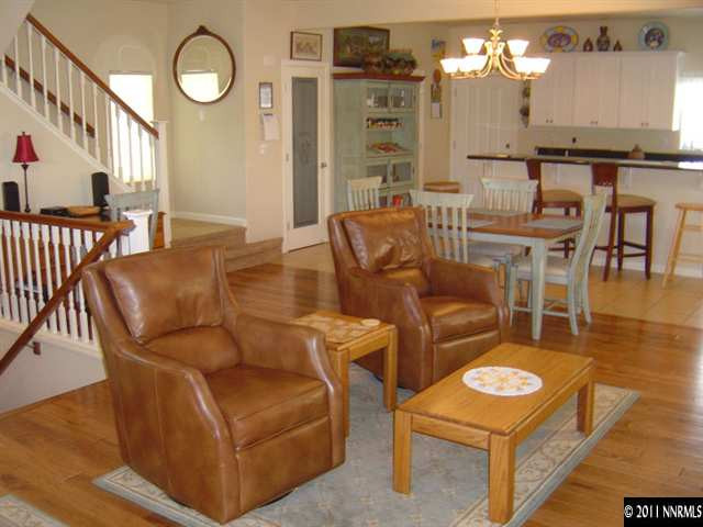 2151 Virginia Lake Way Reno, NV 89509 - Photo 4 of 9 a living room with furniture a rug and kitchen view