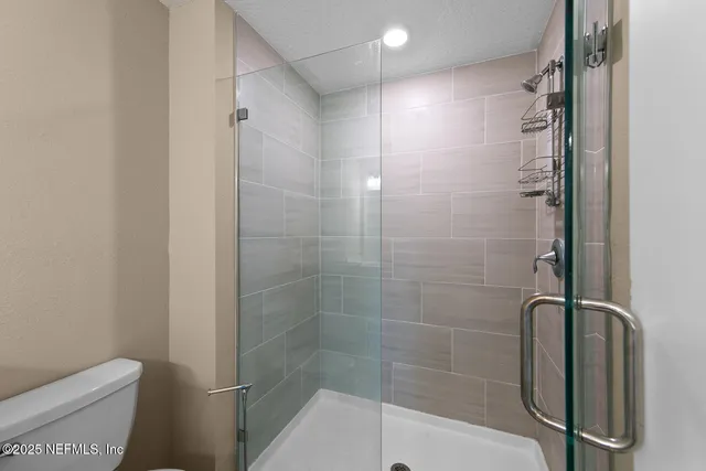 a bathroom with a sink vanity and a mirror
