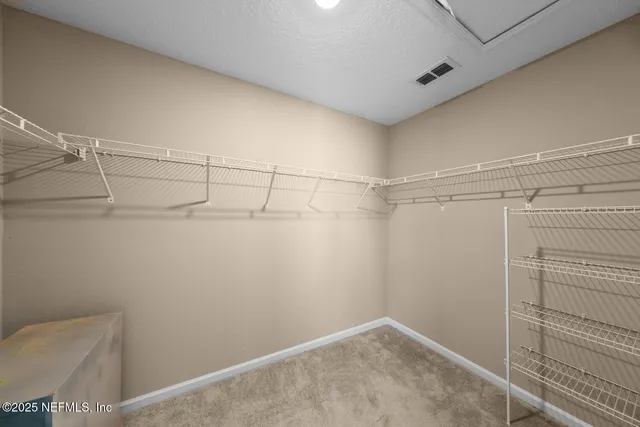 a bathroom with a shower and toilet