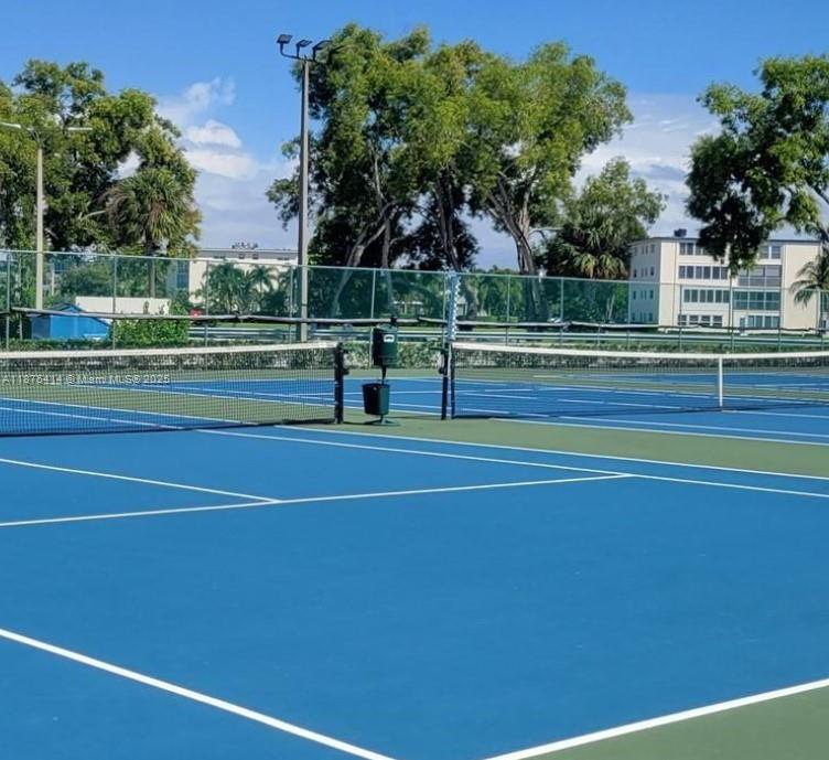 37 Brighton A, Unit 37 Boca Raton, FL 33434 - Photo 26 of 30 a view of a tennis court