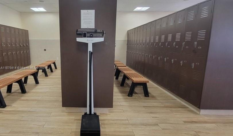 37 Brighton A, Unit 37 Boca Raton, FL 33434 - Photo 27 of 30 a view of a hallway with seating area