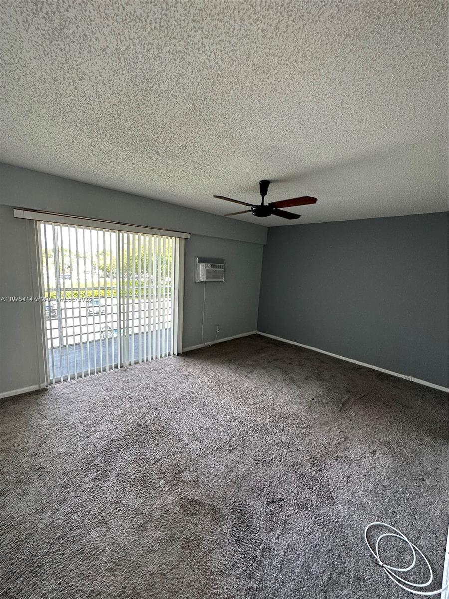 37 Brighton A, Unit 37 Boca Raton, FL 33434 - Photo 9 of 30 a view of an empty room with a window