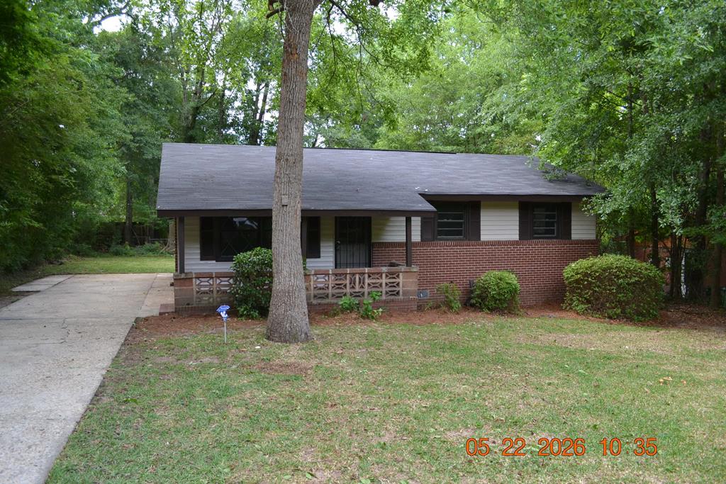 5552 Valleybrook Road Columbus, GA 31907 - Photo 1 of 27 a front view of a house with garden