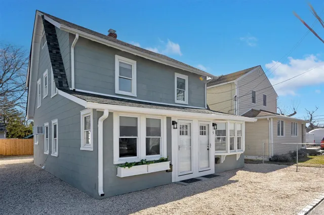 a view of a house with a large window