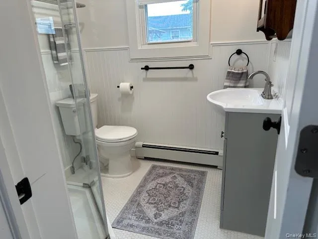 a bathroom with a sink and a toilet