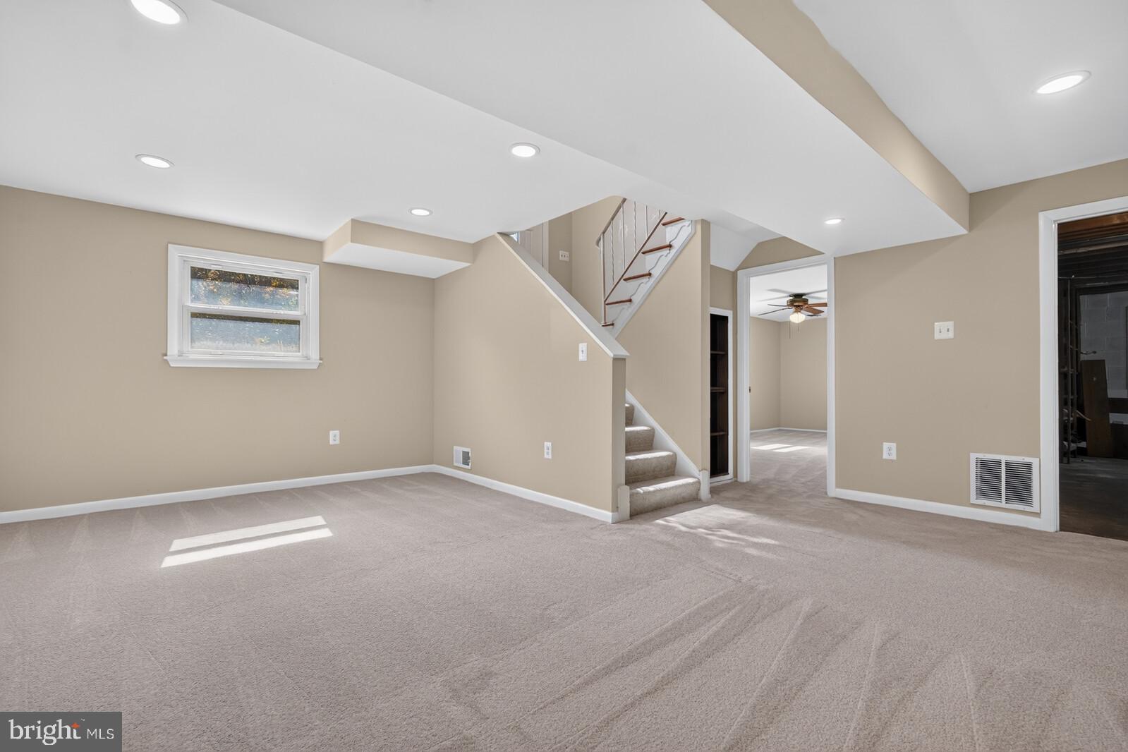 204 Rolling Road Gaithersburg, MD 20877 - Photo 27 of 53 Family room - light-filled, new carpet