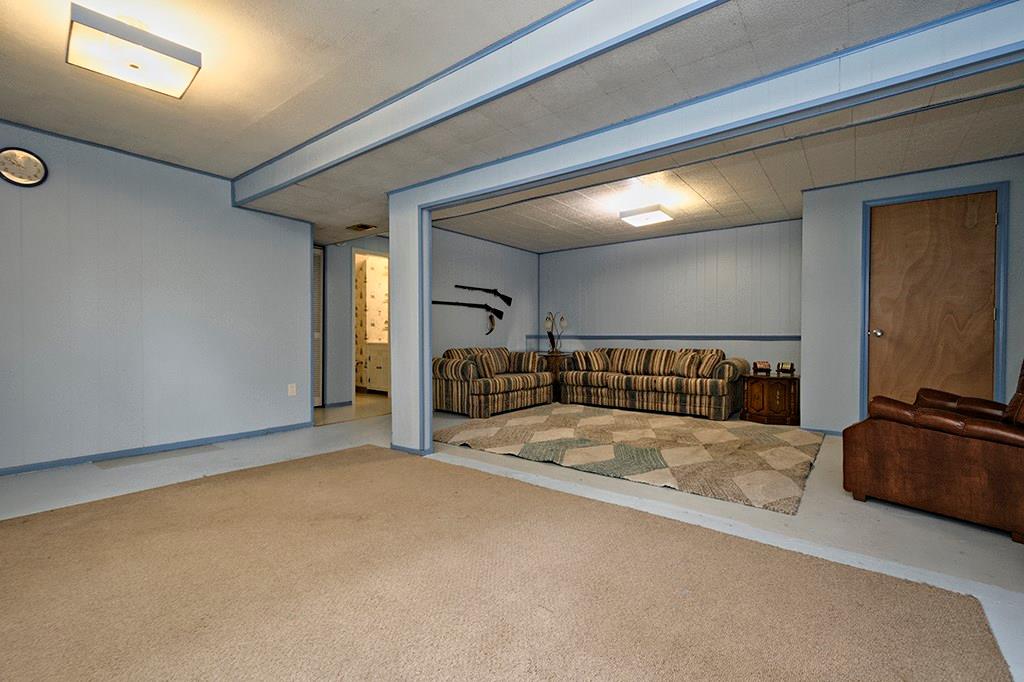 210 Ridgeway Drive Baden, PA 15005 - Photo 14 of 23 Family Room 24 Ft. X 18 Ft. Walk Out Lower Level with Powder Room and 2nd Laundry Room.