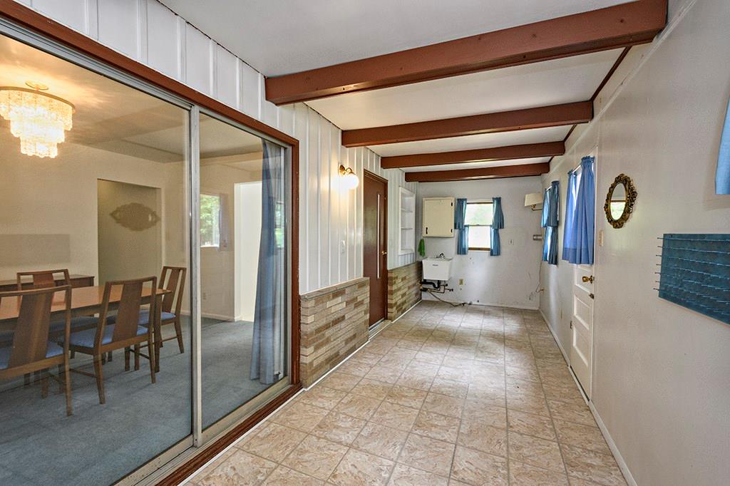 210 Ridgeway Drive Baden, PA 15005 - Photo 22 of 23 Laundry Room and Storage on Main Level. The door to the right leads you to your Trex Deck. There is a second laundry room on the lower level.