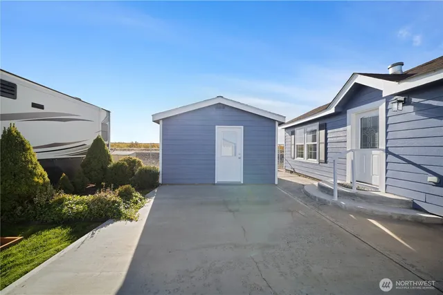a house view with a backyard space