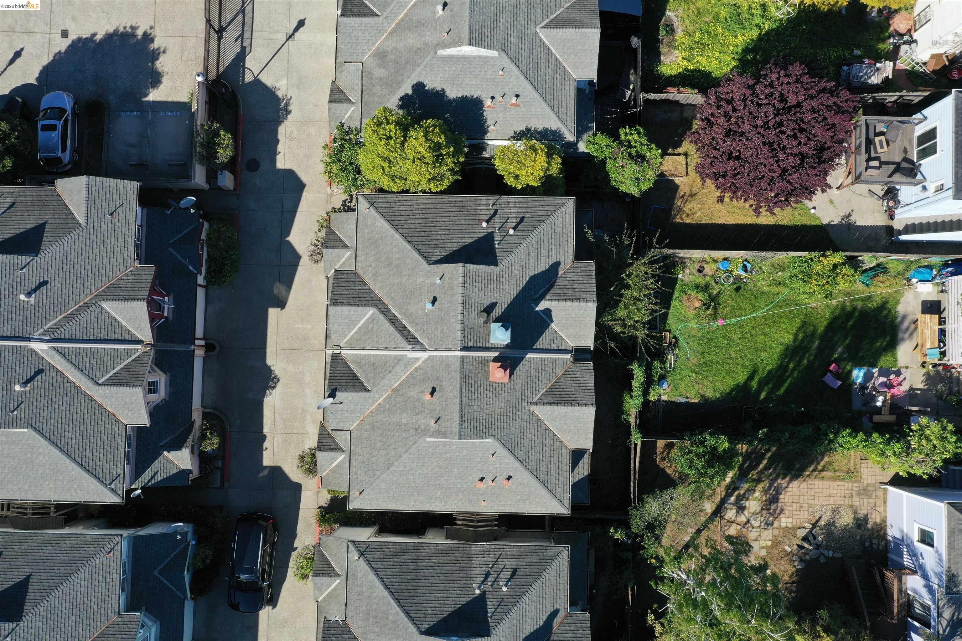 1496 Adeline Street Oakland, CA 94607 - Photo 15 of 17 an aerial view of a house with a yard and potted plants