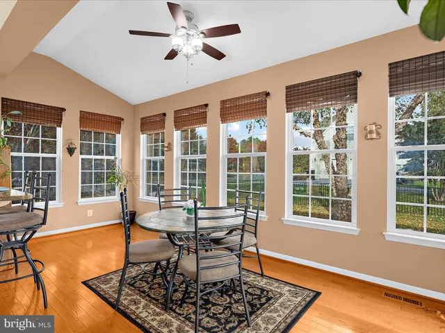 a bedroom with a bed and a chair