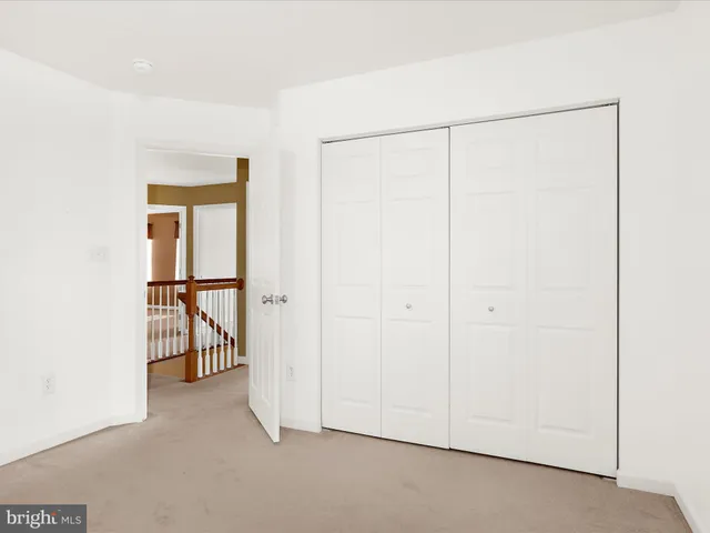 a view of livingroom with hardwood floor and a ceiling fan