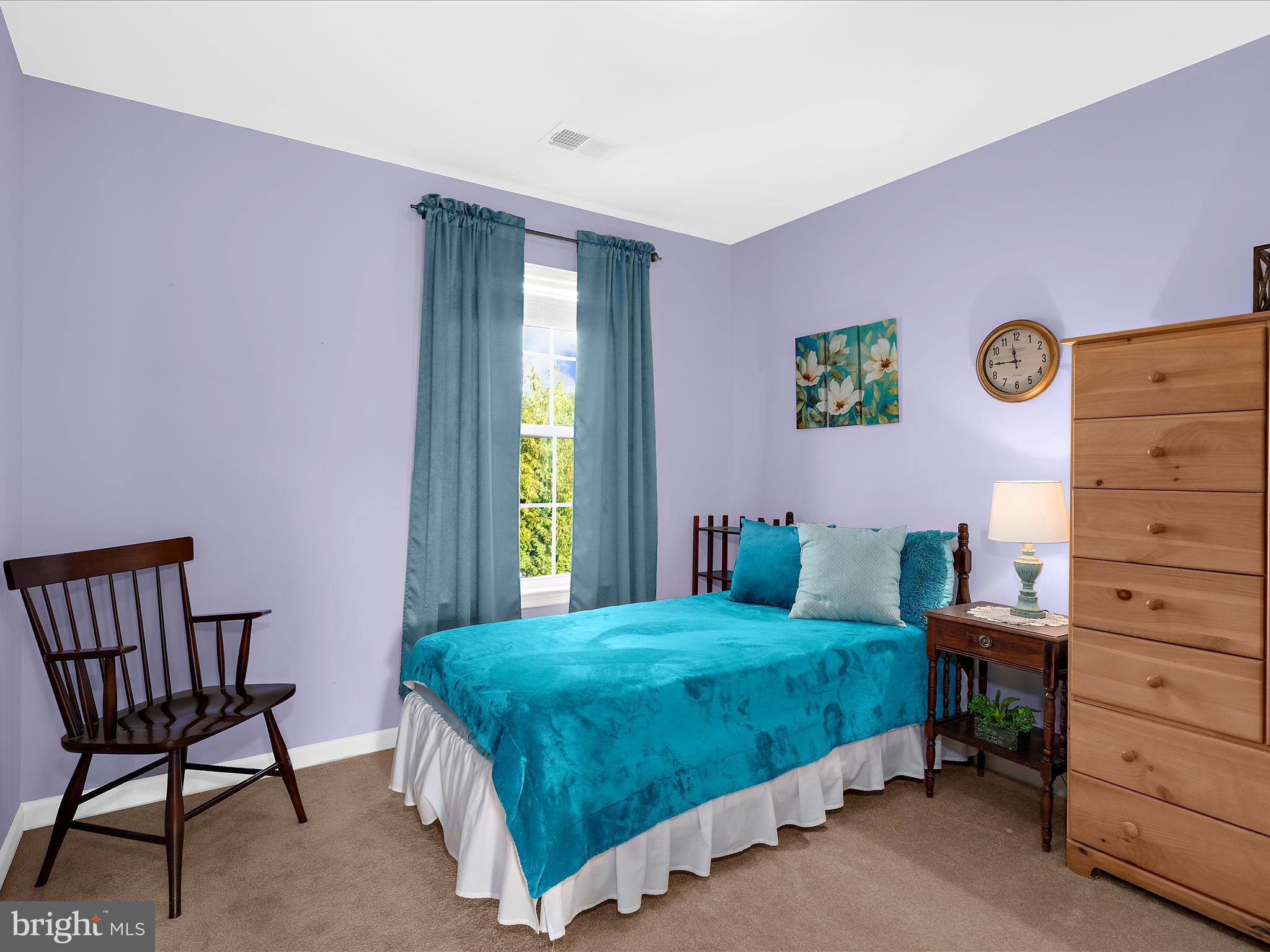 100 Adela Way Chestertown, MD 21620 - Photo 29 of 67 a bedroom with a bed and a chair