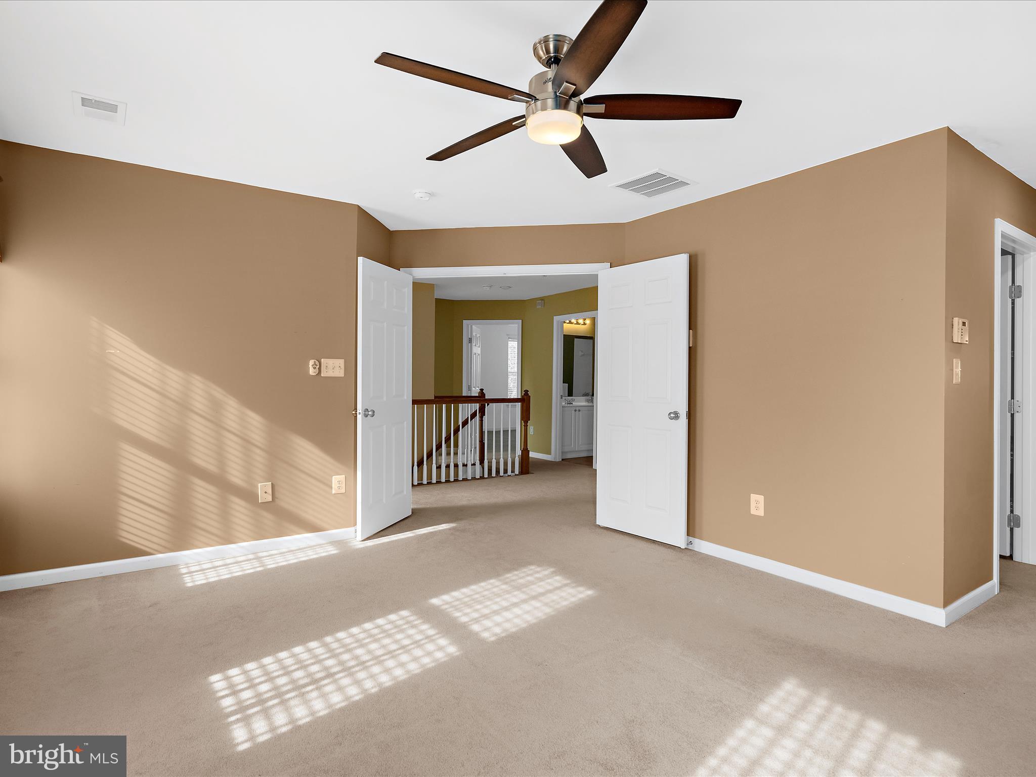 100 Adela Way Chestertown, MD 21620 - Photo 32 of 67 a view of livingroom with hardwood floor and a ceiling fan