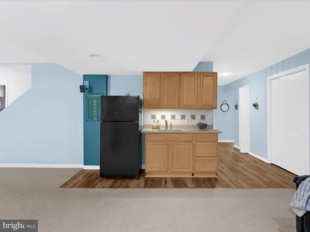 a front view of house with garden