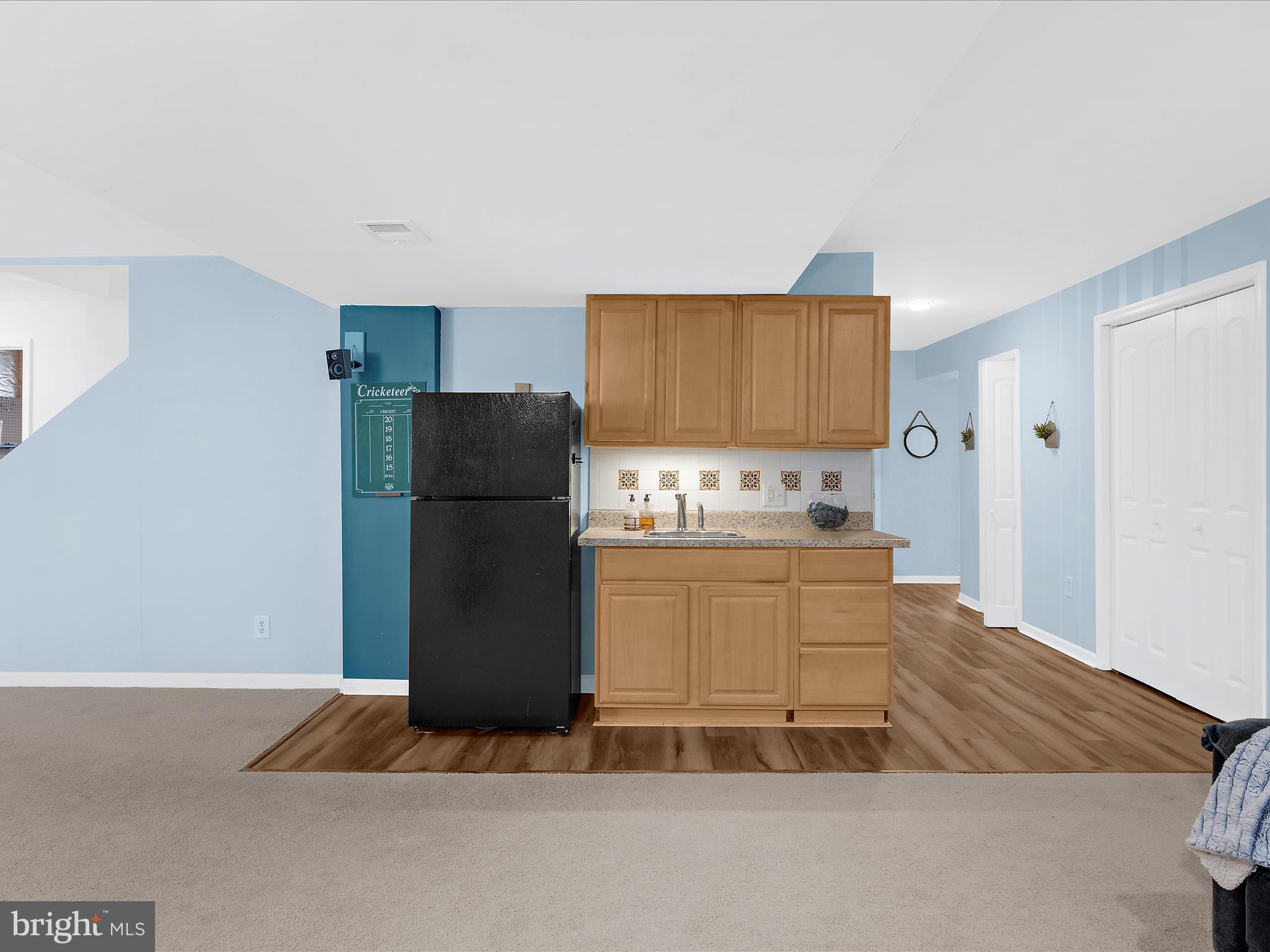 100 Adela Way Chestertown, MD 21620 - Photo 37 of 67 a kitchen with granite countertop a refrigerator and a stove