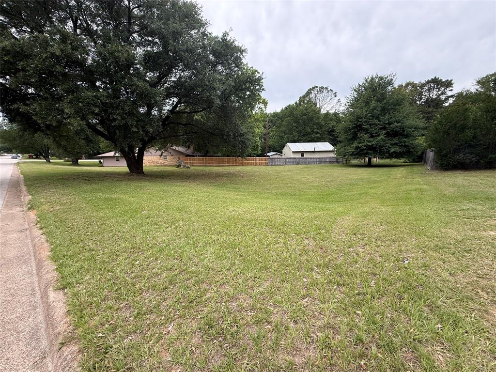 3303 Bogota Road Athens, TX 75752 - Photo 2 of 5 a white house with a trees in front of it