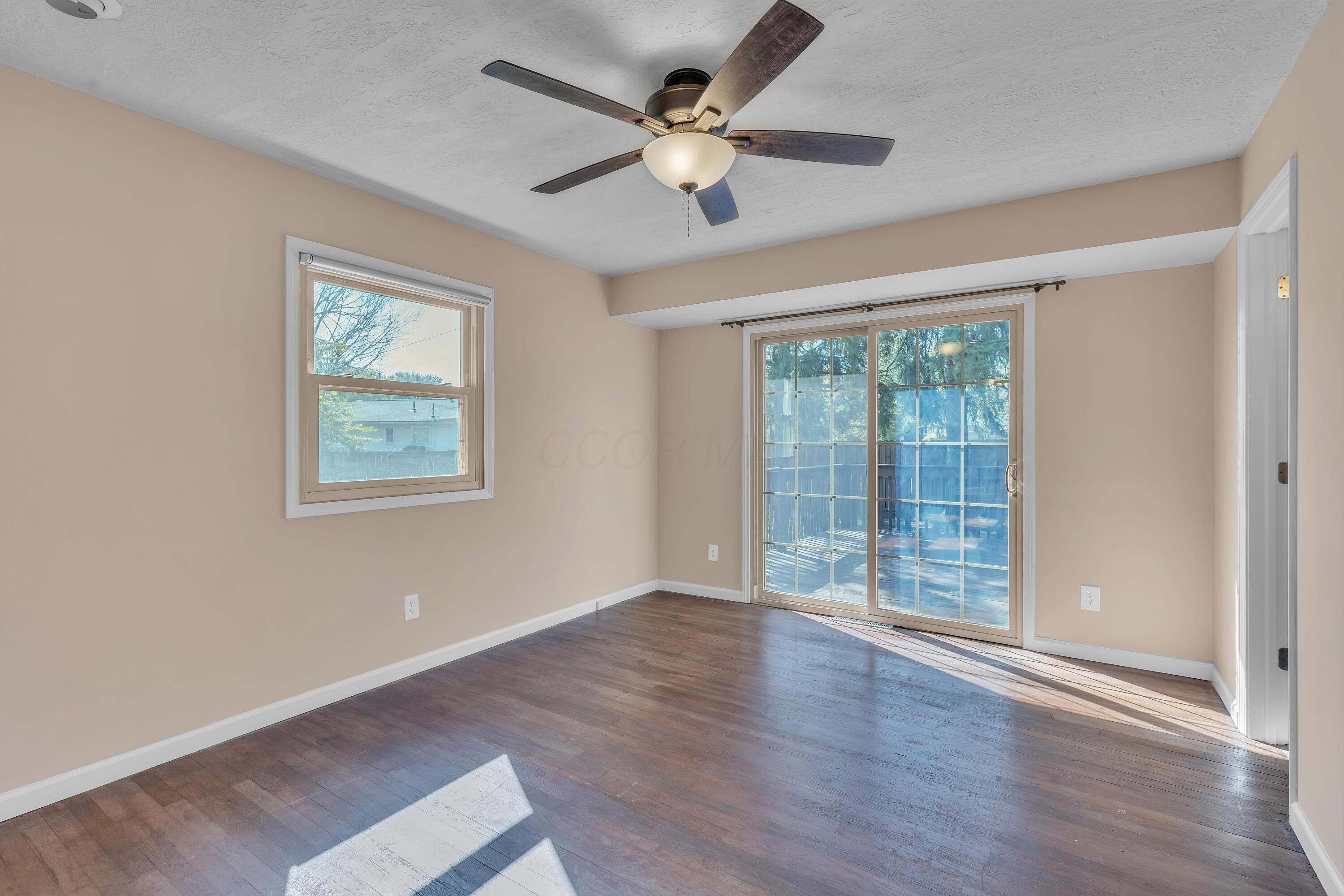 6198 Karl Road Columbus, OH 43229 - Photo 27 of 37 Primary Bedroom with deck access