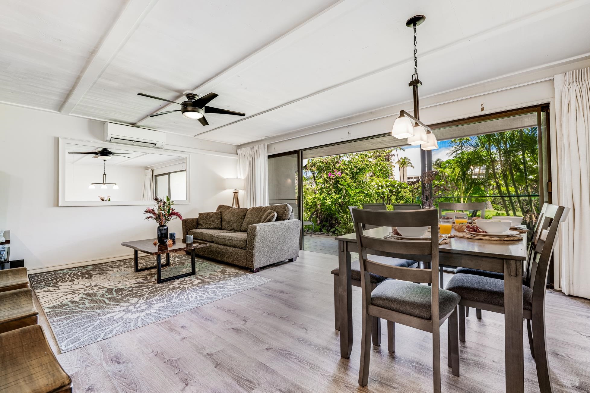 811 South Kihei Road, Unit 5D Kihei, HI 96753 - Photo 2 of 39 a living room with furniture and a window