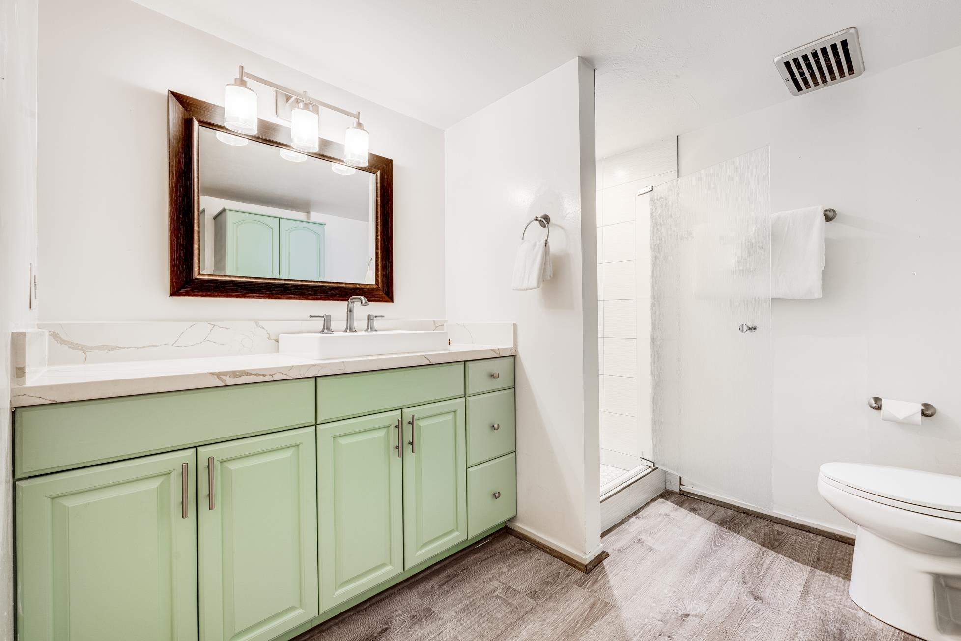 811 South Kihei Road, Unit 5D Kihei, HI 96753 - Photo 23 of 39 a bathroom with a toilet sink and mirror