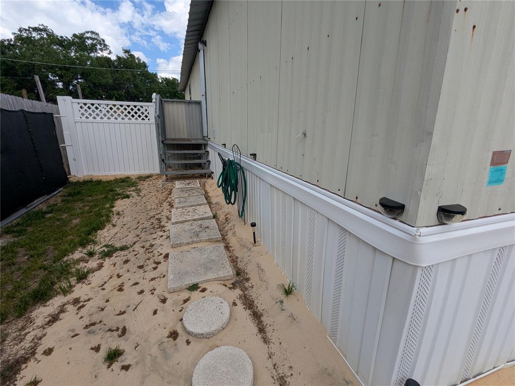 53 Sunset Circle Lake Alfred, FL 33850 - Photo 11 of 13 a view of outdoor space and deck