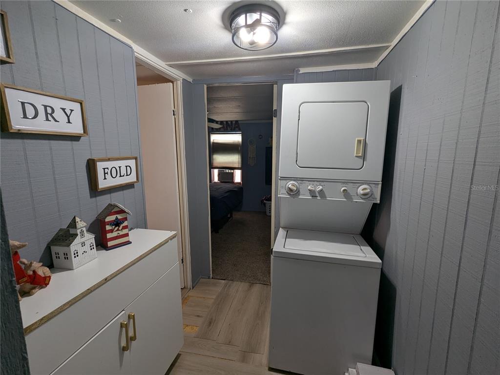 53 Sunset Circle Lake Alfred, FL 33850 - Photo 10 of 13 a room with storage and utility