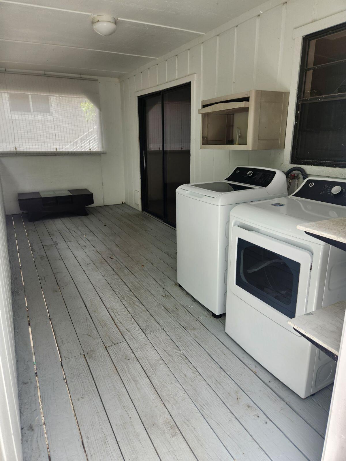757 Musa Drive Key Largo, FL 33037 - Photo 18 of 20 a kitchen with a stove and a microwave