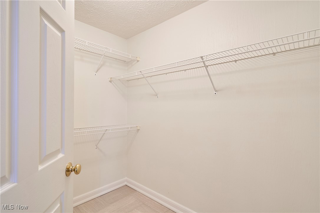 637 Redfield Lane Akron, OH 44321 - Photo 18 of 31 Master with walk in closet. The closet is located off the master bath