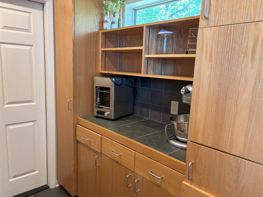 20998 Kiva Circle Flint, TX 75762 - Photo 11 of 40 a kitchen with a refrigerator and cabinets