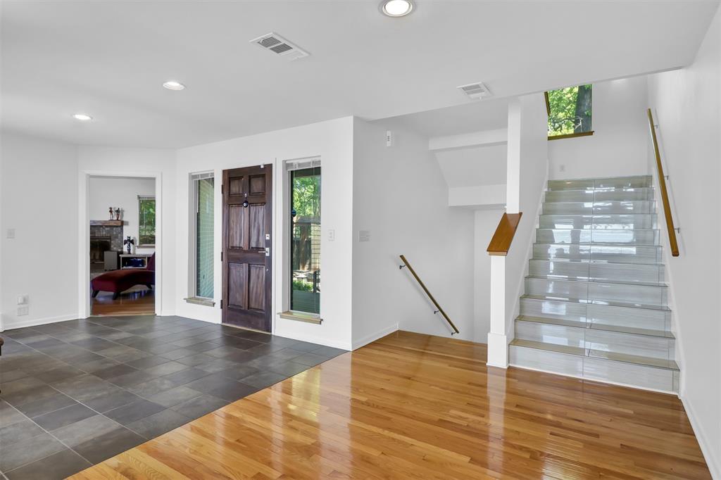 20998 Kiva Circle Flint, TX 75762 - Photo 22 of 40 a view of a hallway with wooden floor and a living room