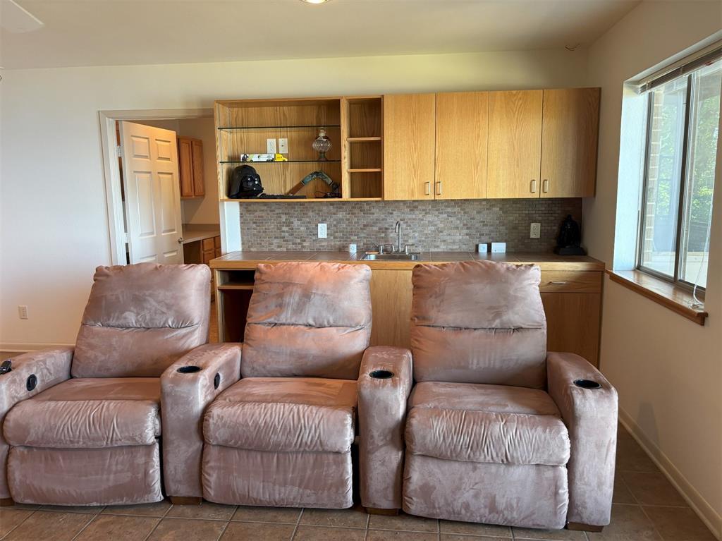 20998 Kiva Circle Flint, TX 75762 - Photo 30 of 40 a living room with furniture and a large window