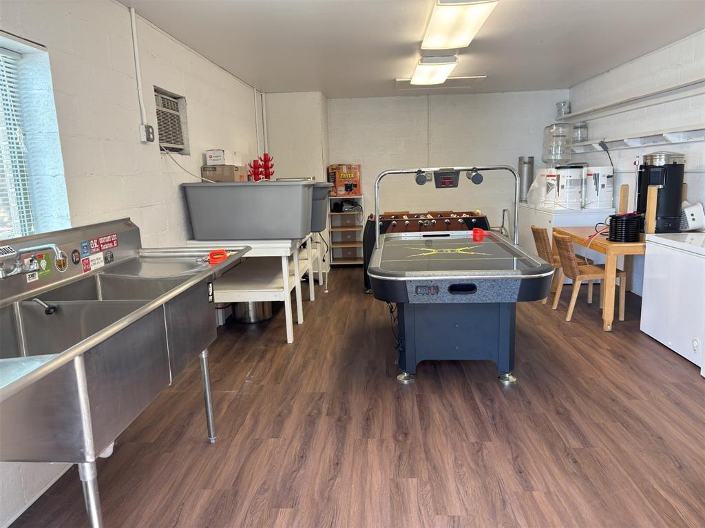 20998 Kiva Circle Flint, TX 75762 - Photo 33 of 40 a room with wooden floors and furniture