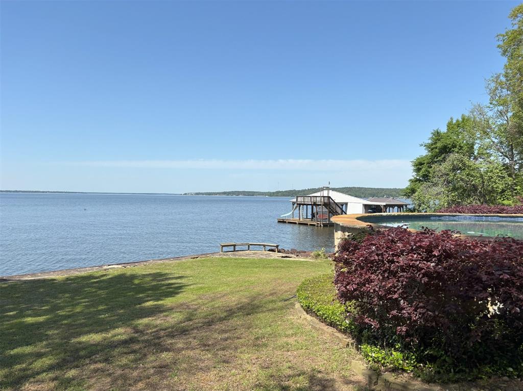 20998 Kiva Circle Flint, TX 75762 - Photo 39 of 40 a view of a large body of water with a house in the background