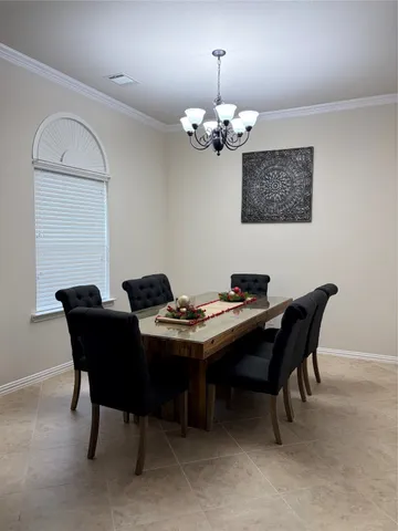 a kitchen with granite countertop cabinets and steel stainless steel appliances