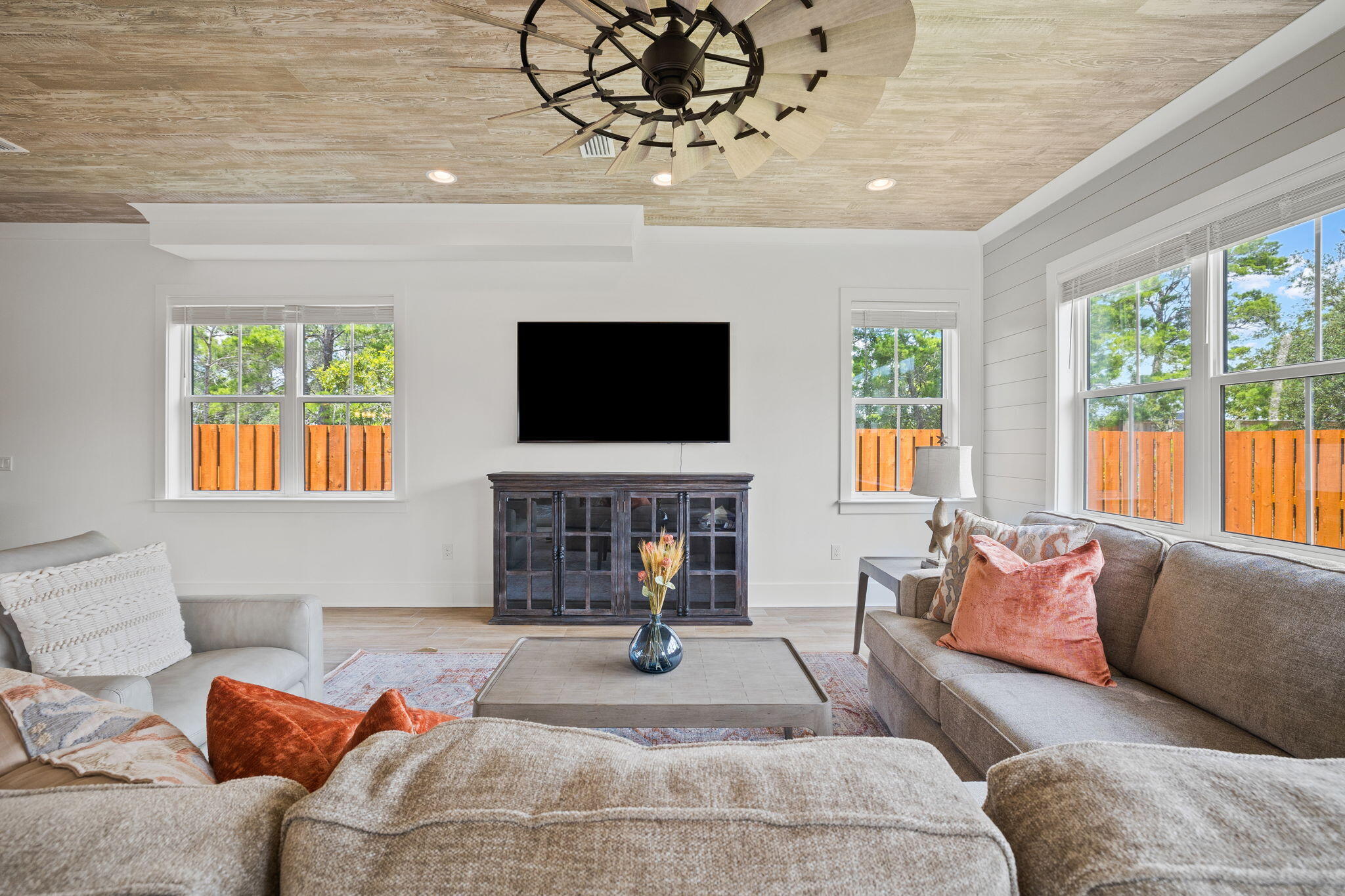 58 Carefree Lane Santa Rosa Beach, FL 32459 - Photo 13 of 44 a bedroom with furniture and a flat screen tv