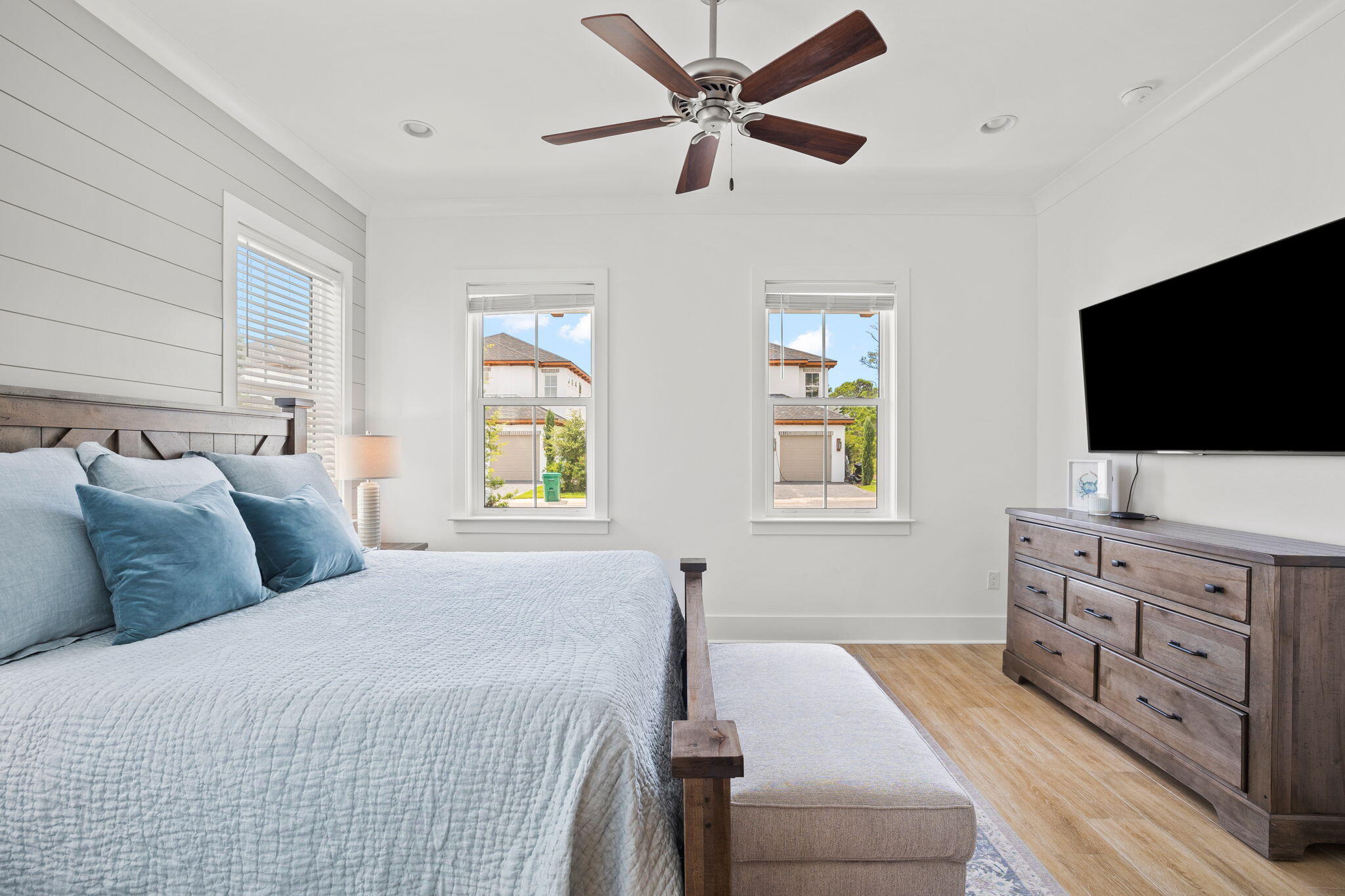 58 Carefree Lane Santa Rosa Beach, FL 32459 - Photo 16 of 44 a bedroom with furniture and a flat screen tv