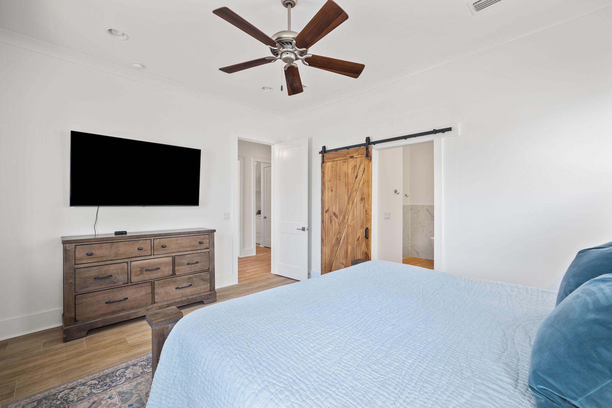 58 Carefree Lane Santa Rosa Beach, FL 32459 - Photo 17 of 44 a bedroom with a bed and a flat screen tv