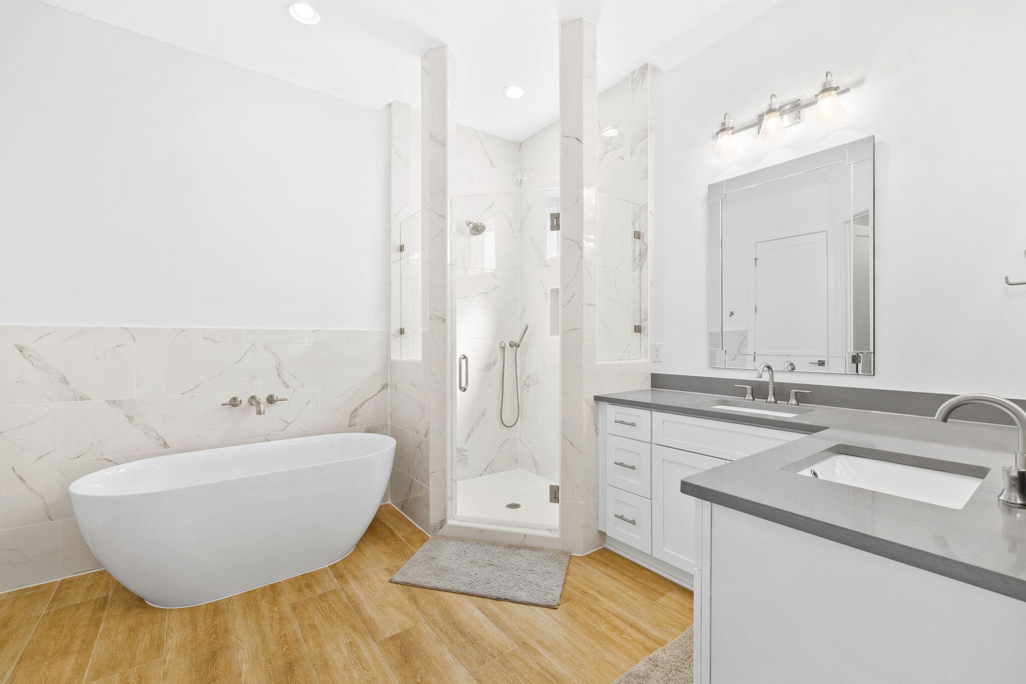 58 Carefree Lane Santa Rosa Beach, FL 32459 - Photo 18 of 44 a spacious bathroom with a bathtub and a sink