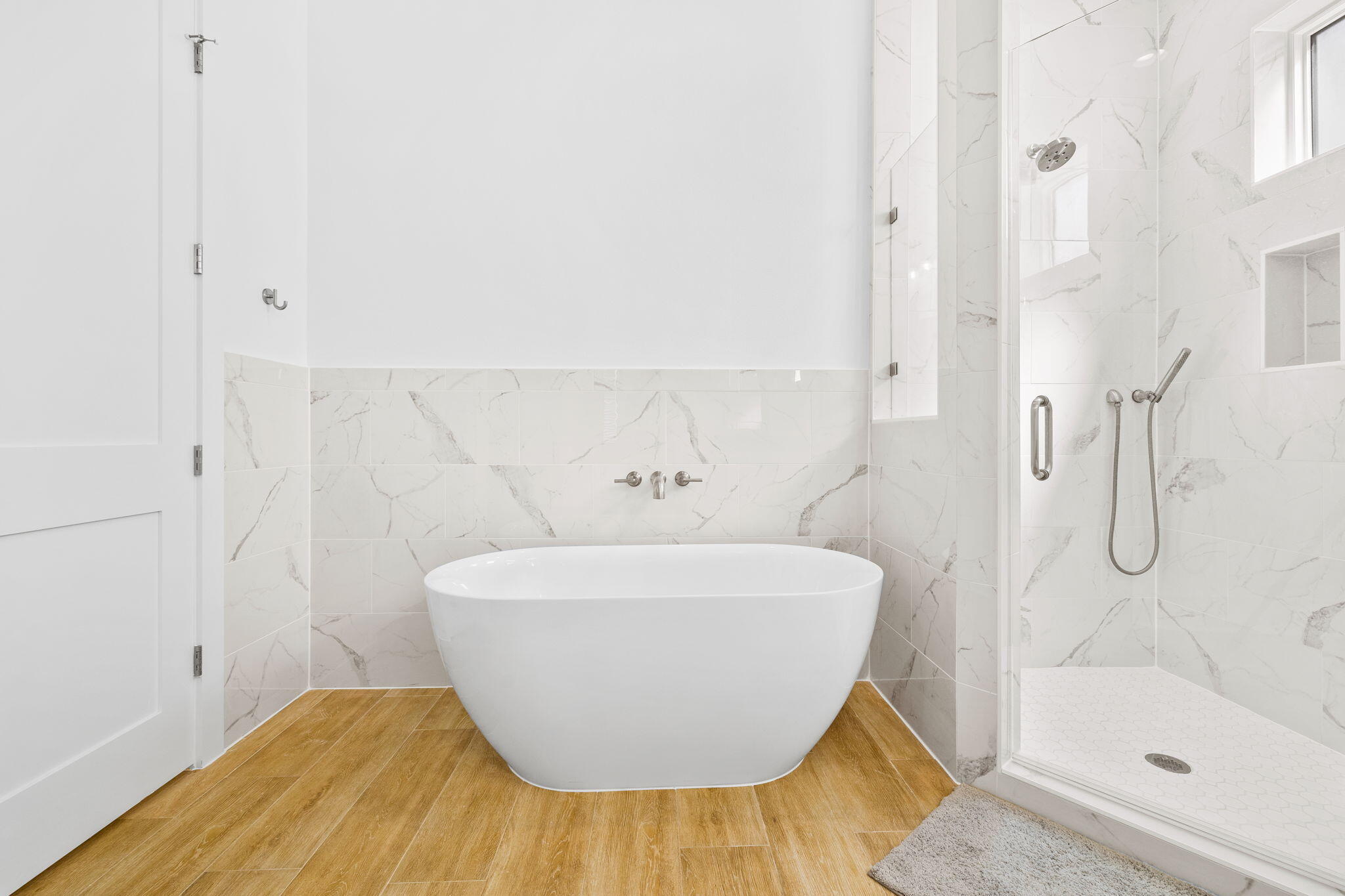 58 Carefree Lane Santa Rosa Beach, FL 32459 - Photo 19 of 44 a bathroom with a bathtub and shower