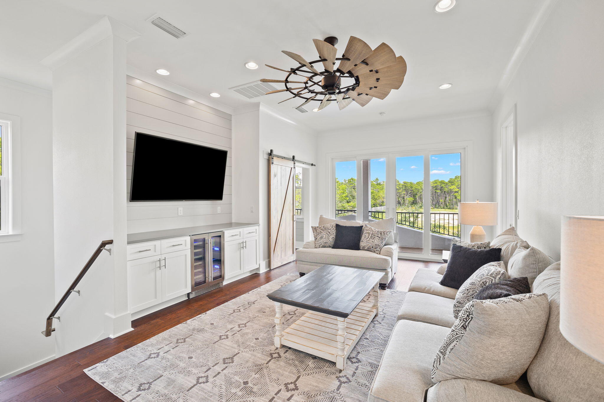 58 Carefree Lane Santa Rosa Beach, FL 32459 - Photo 23 of 44 a living room with furniture and a flat screen tv