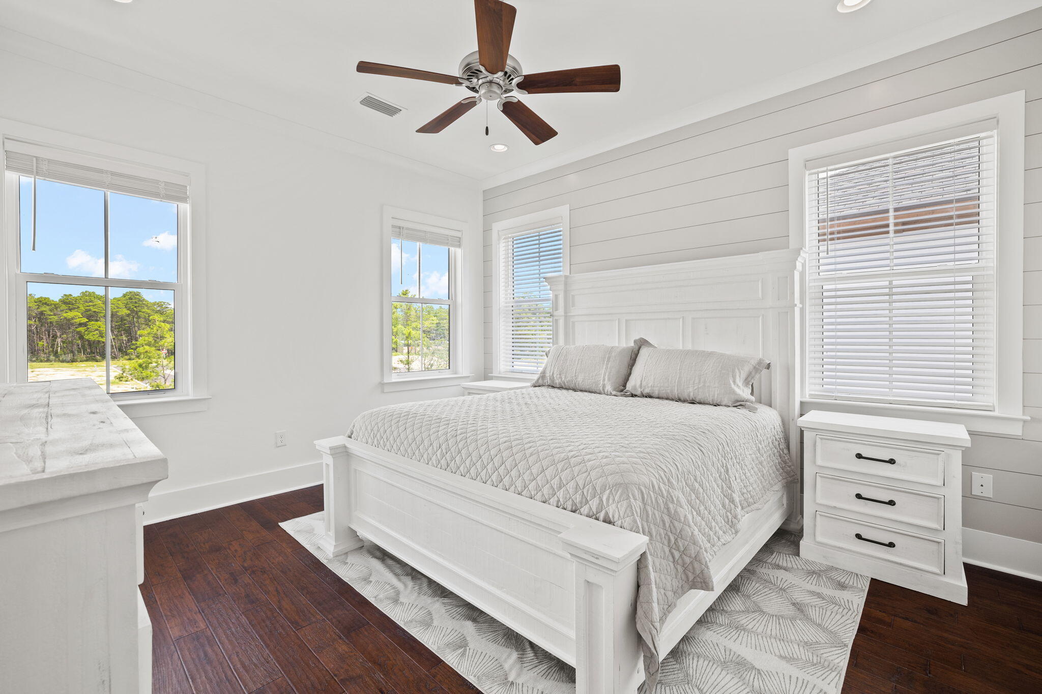 58 Carefree Lane Santa Rosa Beach, FL 32459 - Photo 27 of 44 a bedroom with a bed a dresser and a window