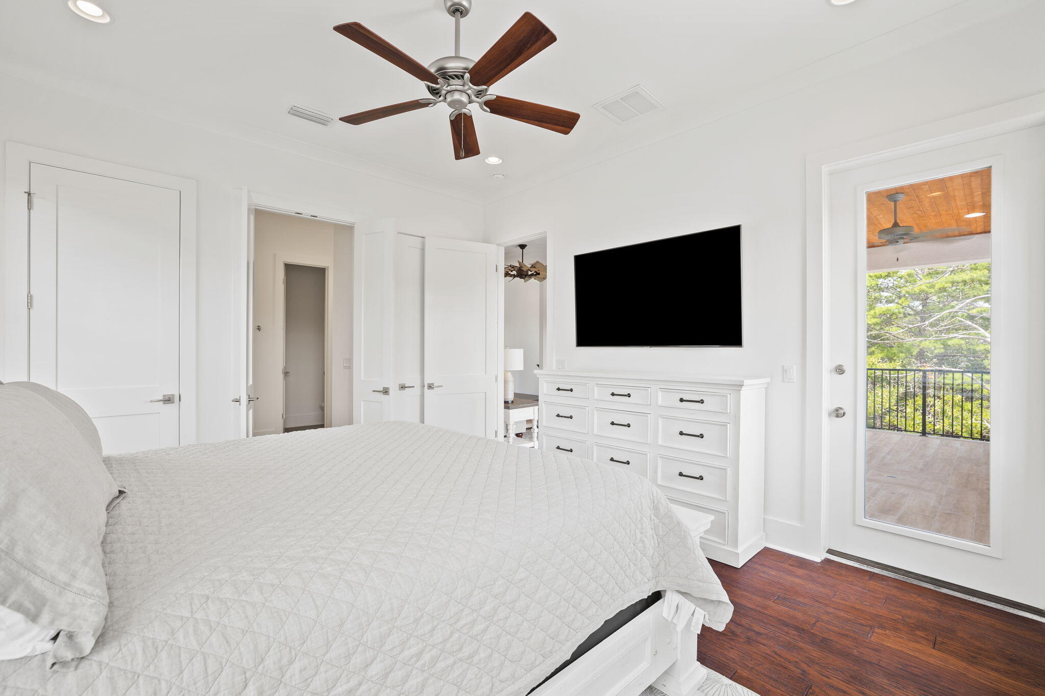 58 Carefree Lane Santa Rosa Beach, FL 32459 - Photo 29 of 44 a bedroom with a bed tv and a window