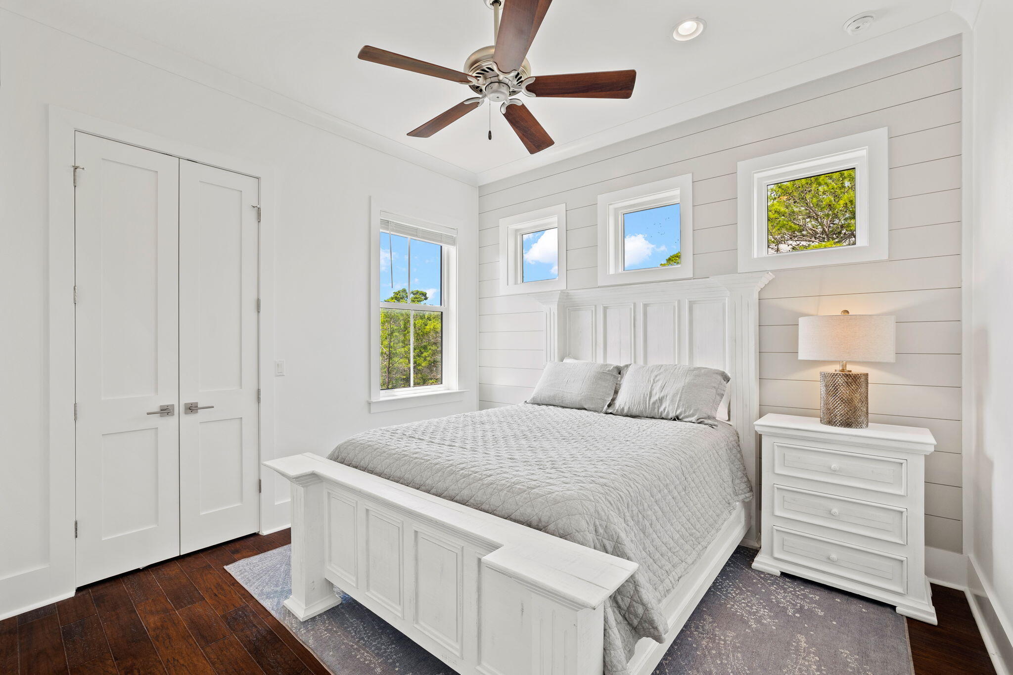 58 Carefree Lane Santa Rosa Beach, FL 32459 - Photo 33 of 44 a bedroom with a bed and a ceiling fan